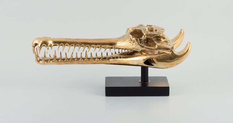 Unknown French sculptor. Large sculpture in gilded metal - modern design in the shape of a crocodile skull.