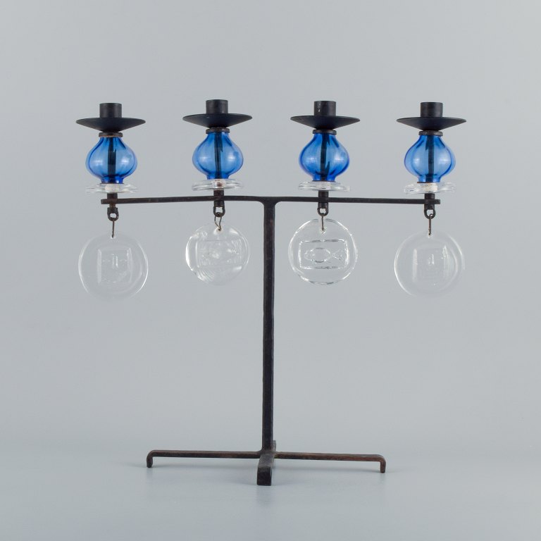 Erik Höglund for Kosta Boda, large candle holder in cast iron with mouth blown glass.