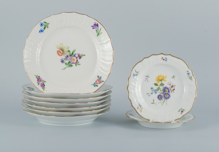 Royal Copenhagen, Saxon flower, nine plates consisting of seven lunch plates and two smaller plates.