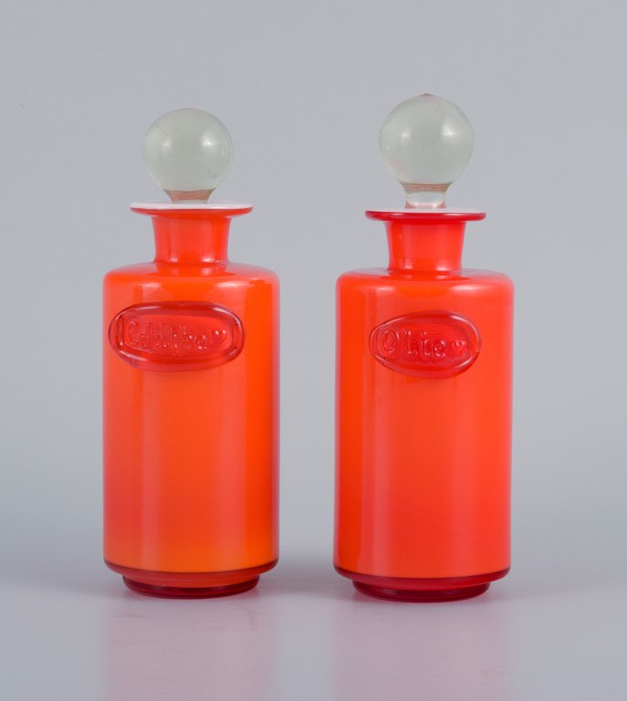 Michael Bang for Holmegaard.Oil and vinegar containers in orange and white art glass.