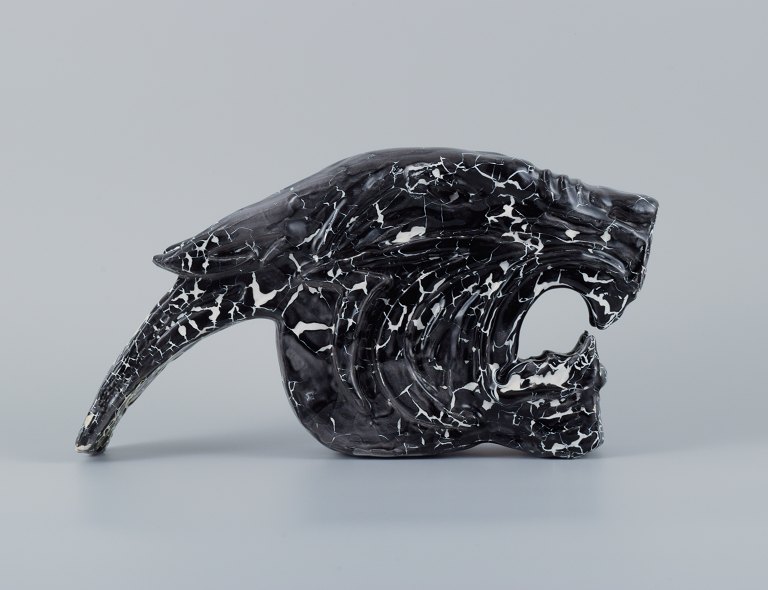 Roger Guerin (1896-1954), unique sculpture in black glazed ceramic in the form of a cat.
