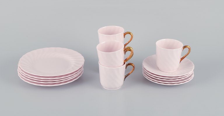 Tuscan, England, five-person coffee service in pink porcelain with gold decoration.
