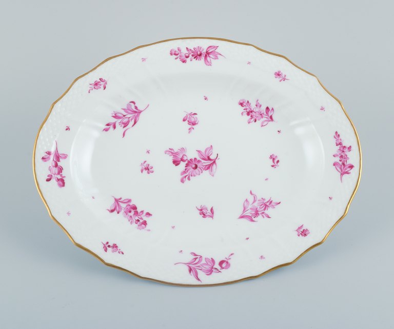 Royal Copenhagen, oval serving dish hand painted with purple flowers and gold rim.