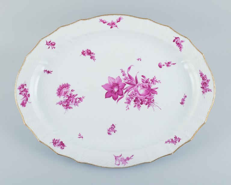 Royal Copenhagen, large oval serving dish hand painted with purple flowers and gold rim.