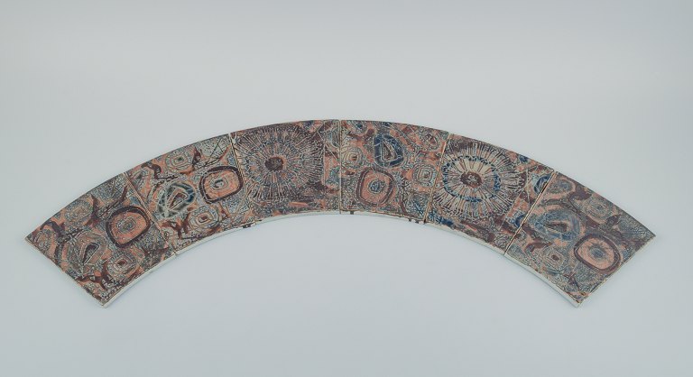 Royal Copenhagen, six Baca faience tiles with patterned glaze in brown, blue and green.