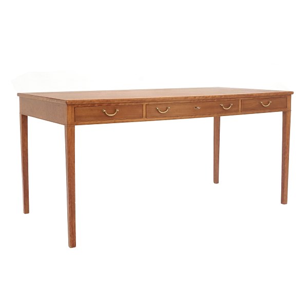 Mahogany writing desk by Ole Wanscher manufactured by A. J. Iversen, Copenhagen. Very nice condition. H: 74cm. Top: 75x150cm