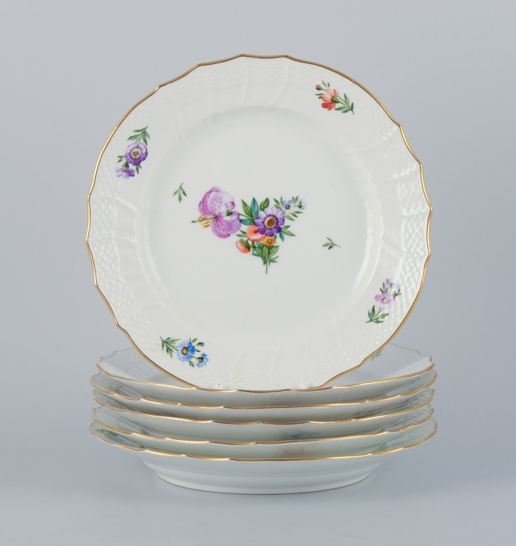 Royal Copenhagen, set of six Saksisk Blomst lunch plates. Hand-painted with various polychrome floral motifs.