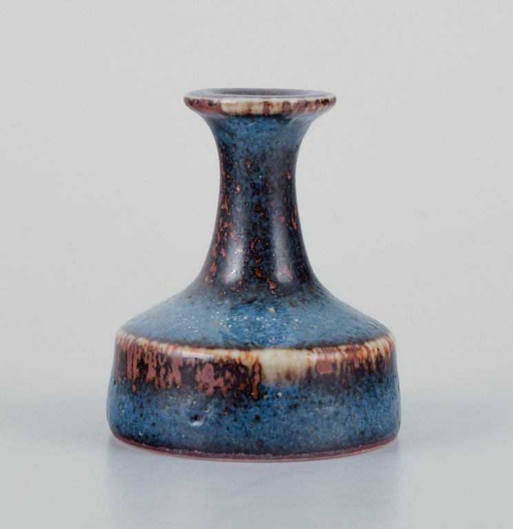 Stig Lindberg (1916-1982), Gustavsberg - Studio Hand, miniature vasewith glaze in blue and brown tones.