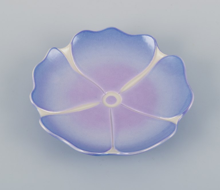 Margareta Hennix for Gustavsberg Studiohand, Sweden, unique ceramic bowl in Art Nouveau style shaped like a flower. Glazed in shades of purple.