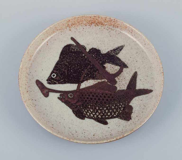 Nils Thorsson for Royal Copenhagen, unique ceramic dish decorated with fish. Glazed in brown tones.
