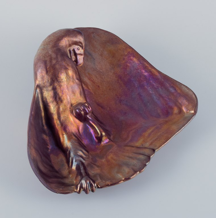 Jens Petersen, unique Art Nouveau ceramic bowl with wall bracket.Modelled with a parrot. Metallic luster glaze.
