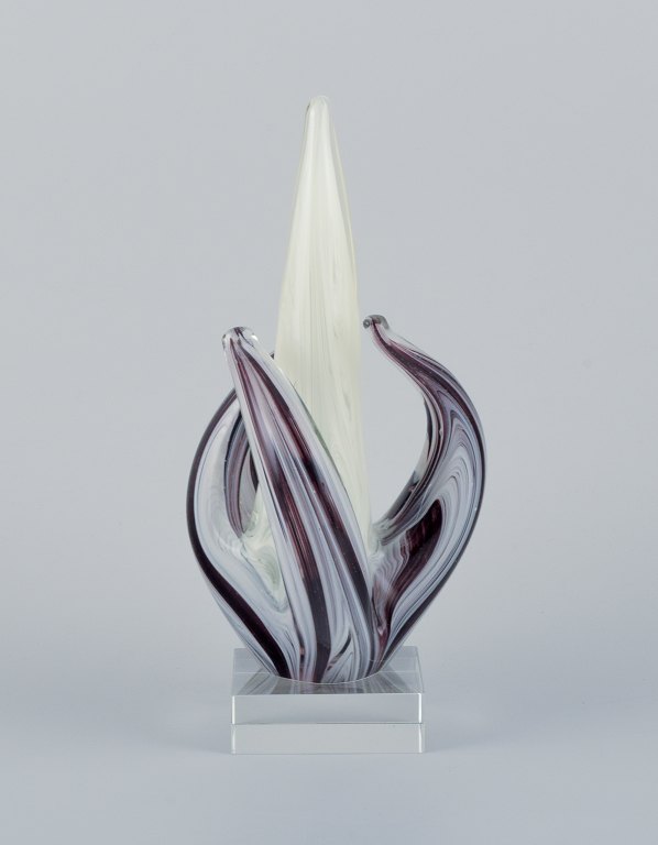 Murano, Italy, art glass sculpture in purple and white glass on a clear glass base.