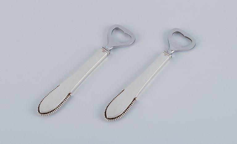 Georg Jensen Kugle. To flaskeåbnere i sterlingsølv.