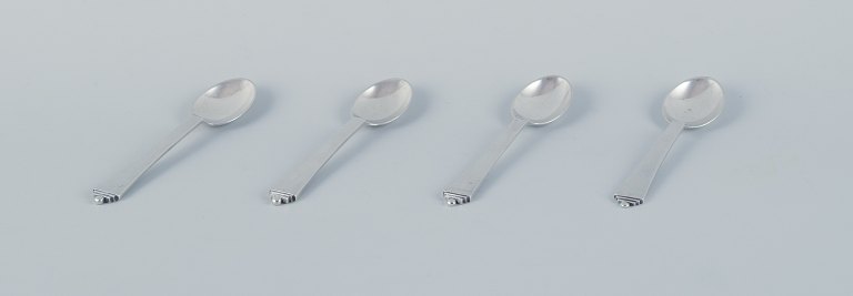 Georg Jensen Pyramid, a set of four large coffee spoons in sterling silver and 830 silver.