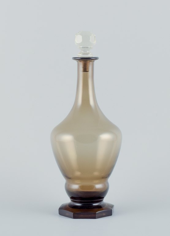Danish glassworks, mouth-blown Art Deco wine decanter in smoked glass with faceted base.