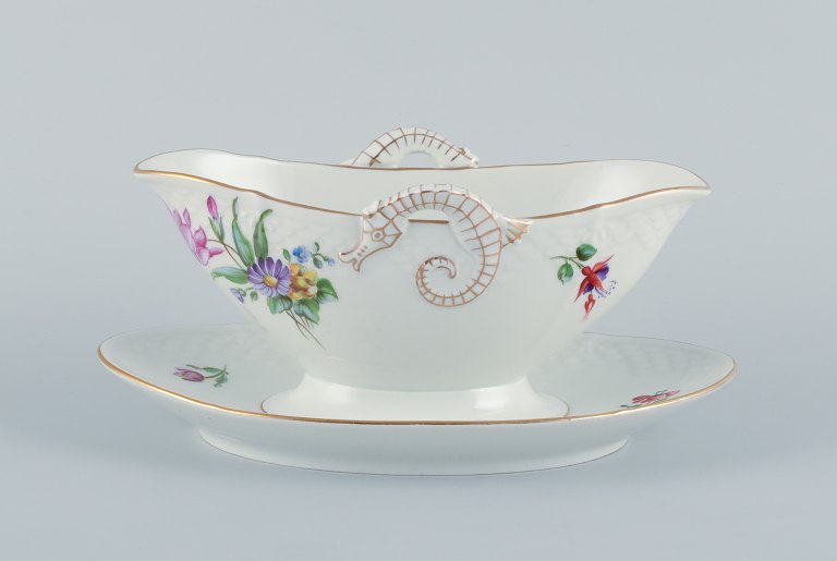 Bing & Grøndahl, Saxon Flower, a hand-painted sauce boat with handles shaped like seahorses.