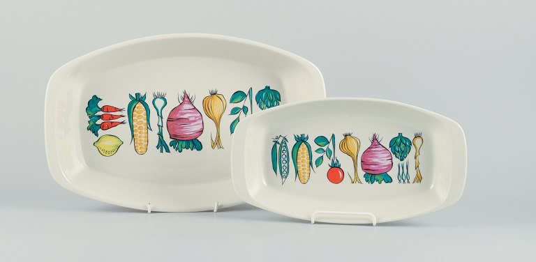 Villeroy & Boch, Luxembourg, two large "Primabella" platters in stoneware featuring various vegetable motifs.