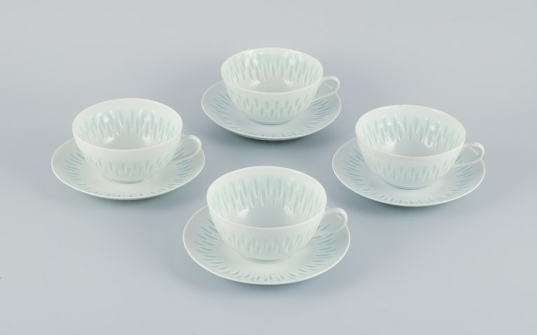 Friedl Holzer-Kjellberg for Arabia,  Finland, four pairs of large tea cups with saucers in rice porcelain.