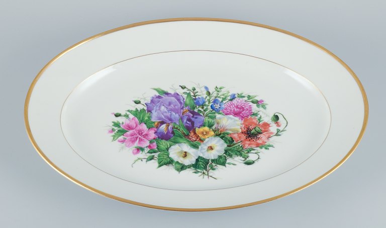 Bing & Grøndahl, large oval serving platter hand-painted with polychrome flower motifs and gold trim.