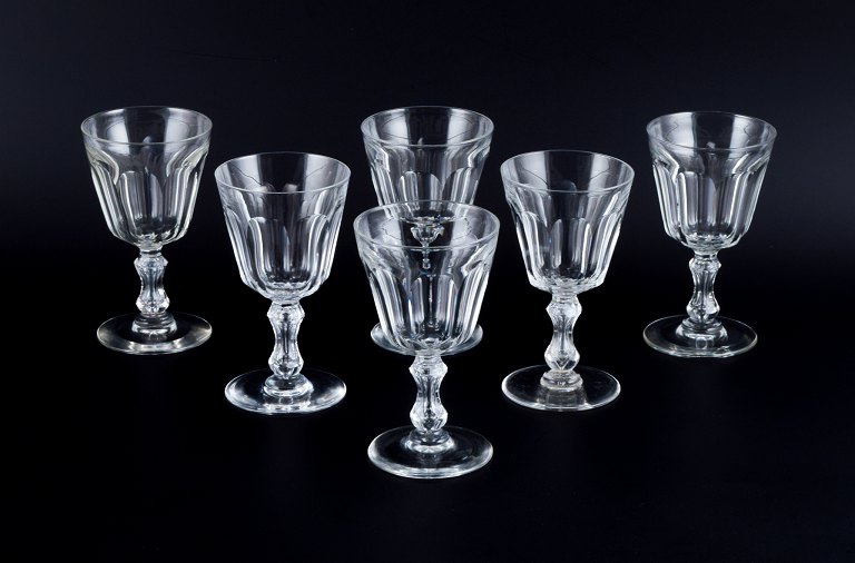 Val St. Lambert, Belgium, a set of six "Lalaing" red wine glasses in clear faceted cut crystal glass.