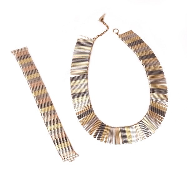 Set of sterlingsilver Rainbow neck- and bracelet by Eigil Jensen for A. Michelsen, Copenhagen. Designed 1966. Necklace L: 44cm. Bracelet L: 19,3cm