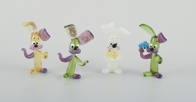 Murano, Italy. A collection of four miniature glass animal figurines in colored art glass.