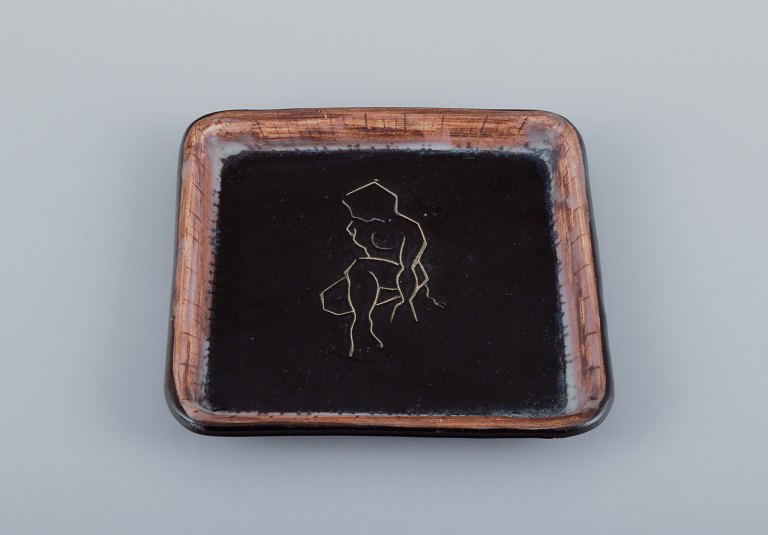 Atelier Cerenne, Vallauris, France.Handmade dish with motif of a nude woman.