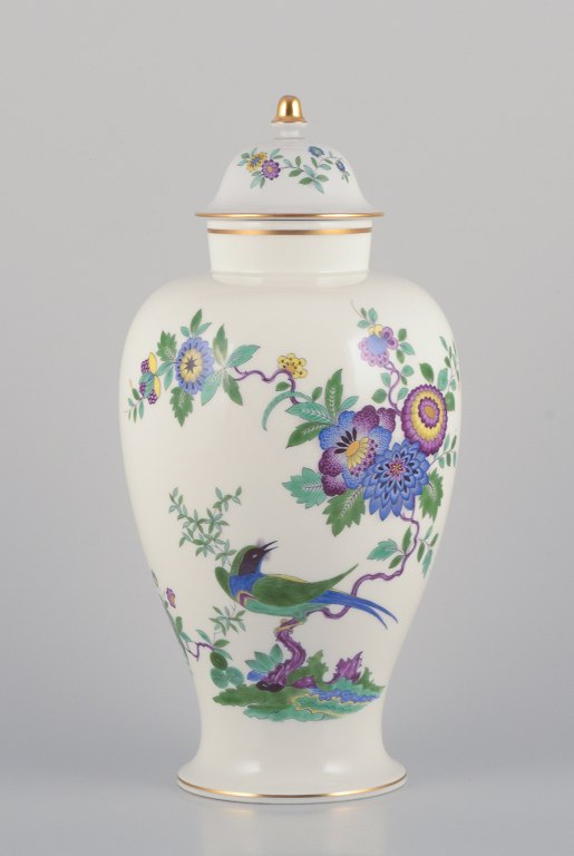Meissen, Germany, large porcelain lidded jar hand-painted with exotic bird and floral motifs.