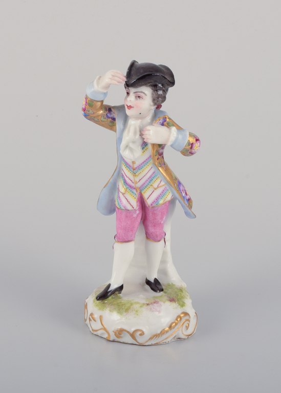 Meissen, Tyskland, tysk porcelænsfigur af ung mand i fine klæder. Håndmalet i polykrome farver.