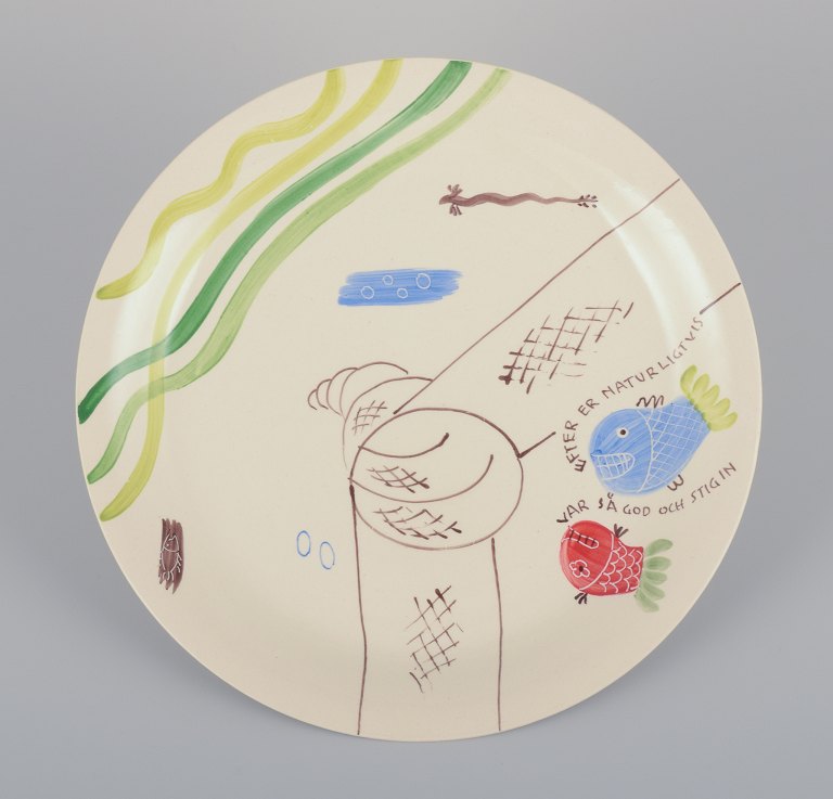 Stig Lindberg for Gustavsberg. "Löja" plate. Hand-painted with a fish motif. Satirical illustration with Swedish text.