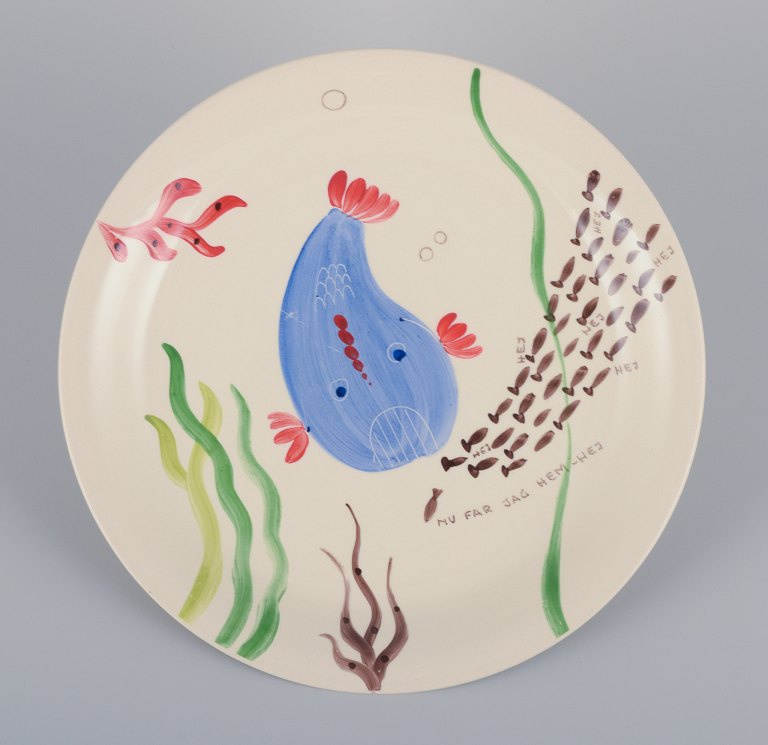 Stig Lindberg for Gustavsberg. "Löja" plate. Hand-painted with a fish motif. Satirical illustration with Swedish text.