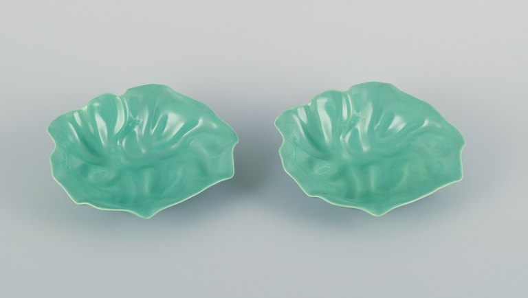 Royal Copenhagen, "4 All Seasons". Two organic-shaped bowls in faience with green glaze.