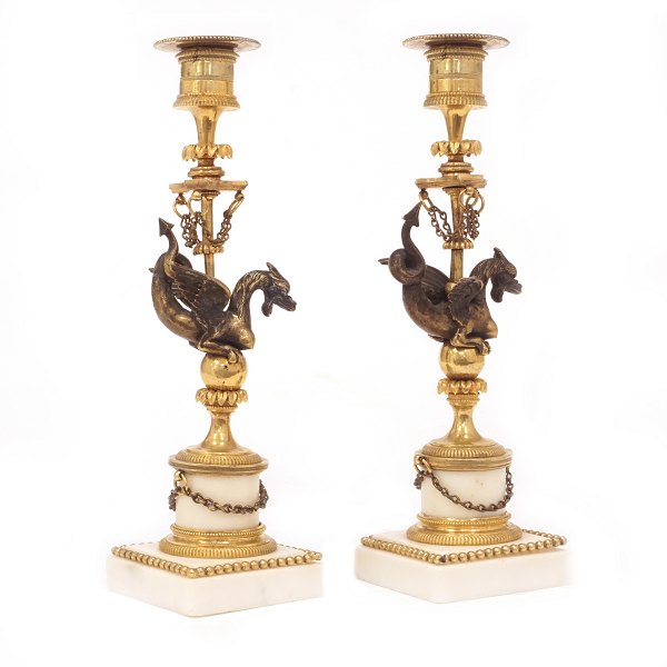 Pair of firegilt bronze candlesticks on a marble base. Sweden circa 1840. H: 26cm