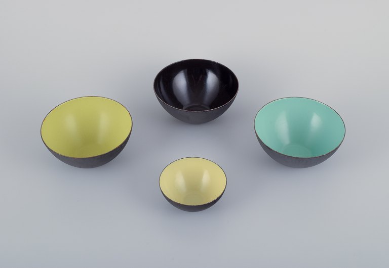 Hermann Krenchel, four Krenit metal bowls with enamel in black, mint green, apple green, and yellow.