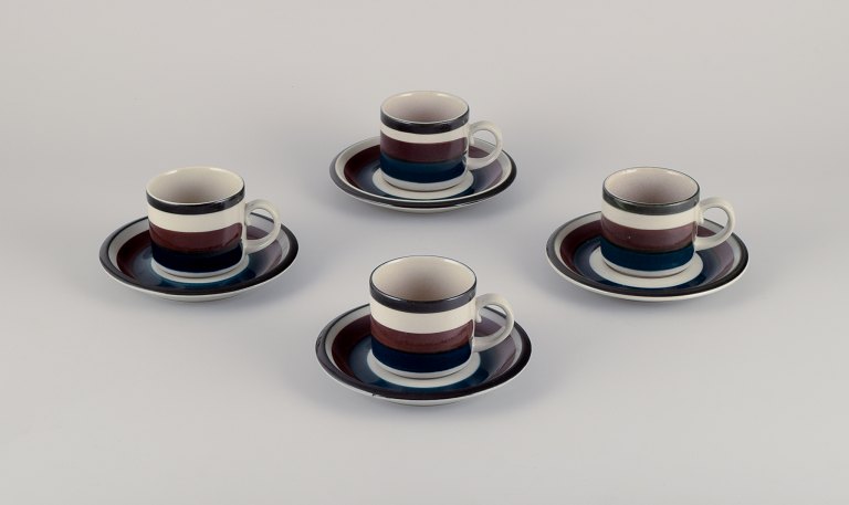 Anja Jaatinen-Winquist for Arabia, Finland. A set of four "Kaira" coffee cups with saucers.