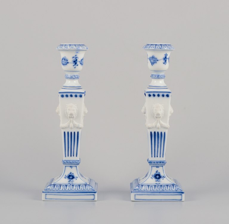 Royal Copenhagen, a pair of Blue Fluted candlesticks.