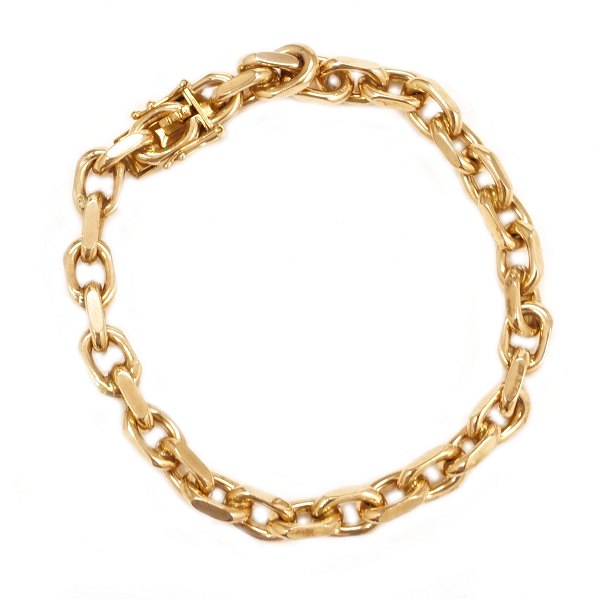 Anker armlænke i 8kt guld med kasselås og dobbelt sikkerhedslås. L: 20,5cm. V: 27gr