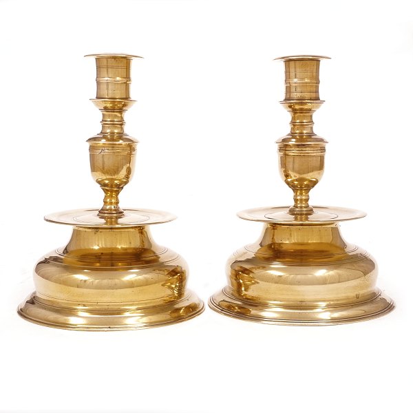 Pair of large Baroque bell shaped brass candlesticks. Denmark circa 1750. H: 21cm. D base: 16cm