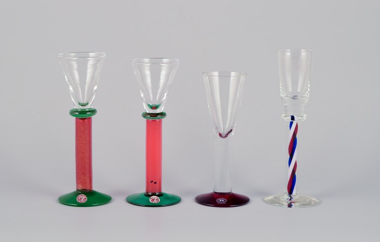 Margareta Hennix for Reijmyre, Sweden. A set of four schnapps glasses. Handmade and mouth-blown art glass in different colors.