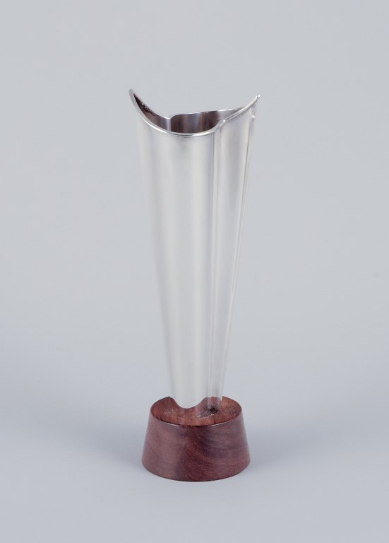 Tapio Wirkkala (1915-1985), Finnish silversmith. Modernist silver vase on a rosewood base.