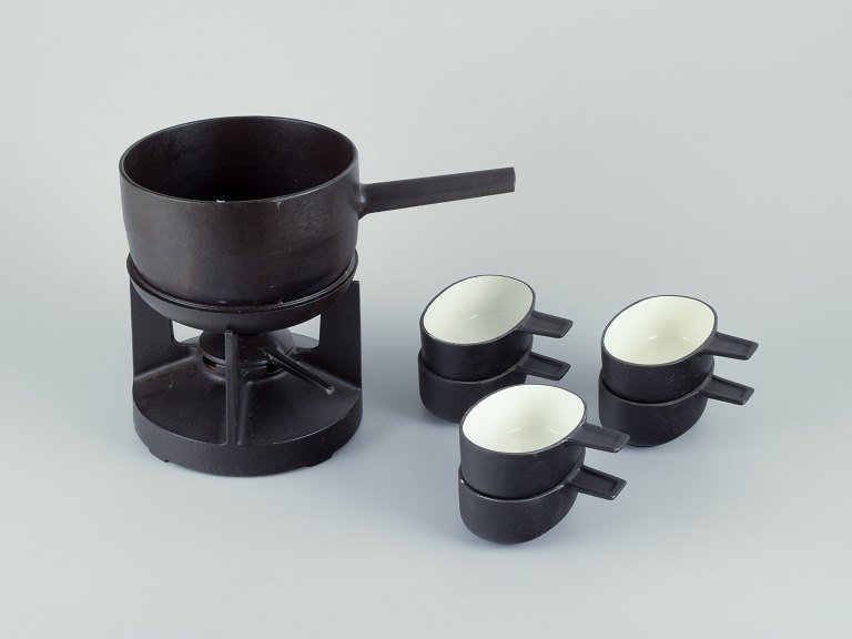 Digsmed Design, Denmark. Cast iron fondue set. Bowls with enamel lining. Serves six people.