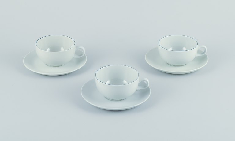 Three Aluminia/Royal Copenhagen blue line coffee cups and saucers.Designed by Grethe Meyer.