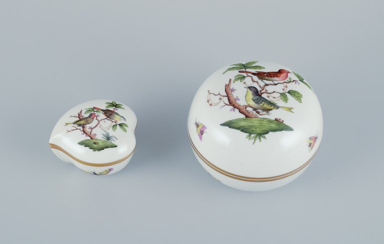 Herend, Hungary. Two porcelain lidded jars hand-painted with butterflies and birds on branches. Gold rim.