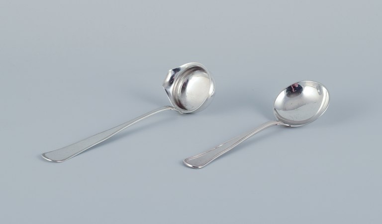 Larsen, Korsør and W&S, Danish silversmiths. Two "Old Danish" sauce ladles in 830 silver.
