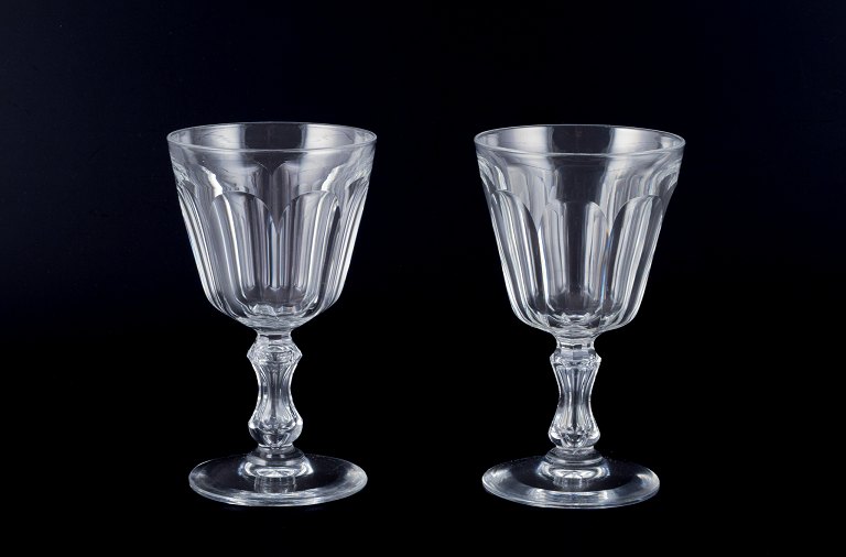 Val St. Lambert, Belgium, two "Lalaing" red wine glasses in clear faceted cut crystal glass.