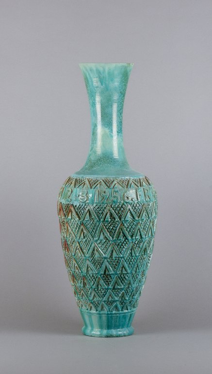 Gudmundur Einarsson (1895-1963), Icelandic ceramist. Ceramic floor vase featuring geometric panels and text.