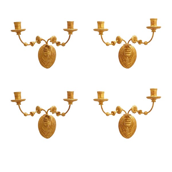 Set of four rare Empire appliques for two candles. Woodcut, gilt. H: 31cm. W: 34cm. D: 30cm