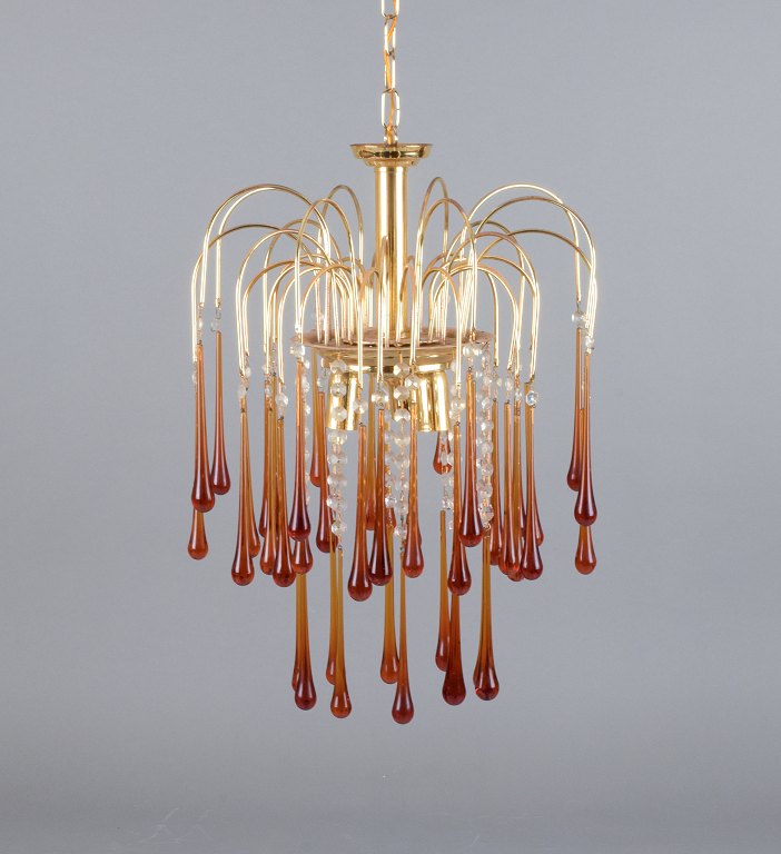 Murano, Italy. Ceiling lamp in amber mouth-blown art glass, brass frame. Italian design.
