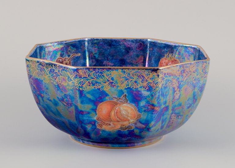 Rosenthal, Germany. Large porcelain bowl in luster glaze. Hand-decorated with fruit motifs and gold leaf decoration.