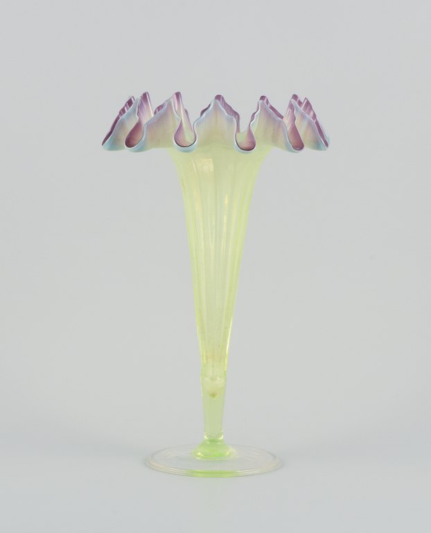 Trelleborgs Glasbruk, Sweden. Trumpet-shaped art glass vase in light green and violet glass. Mouth-blown.